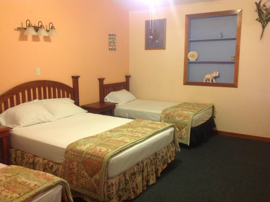Hotel El Delfin Ливингстон Экстерьер фото